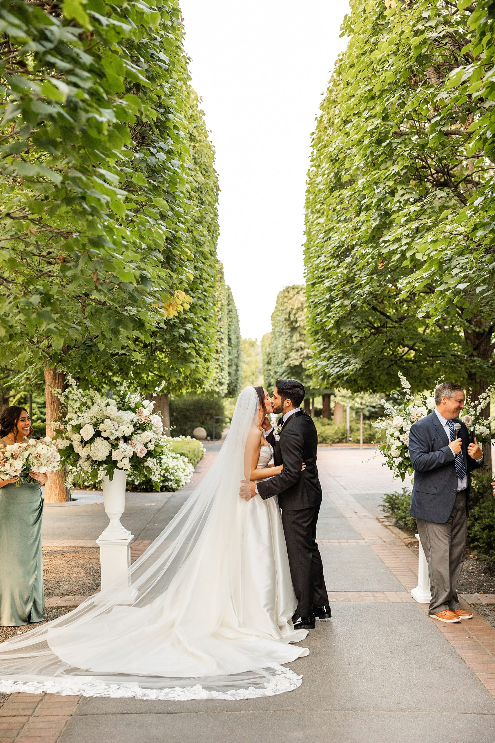 Newlyweds kiss during wedding ceremony