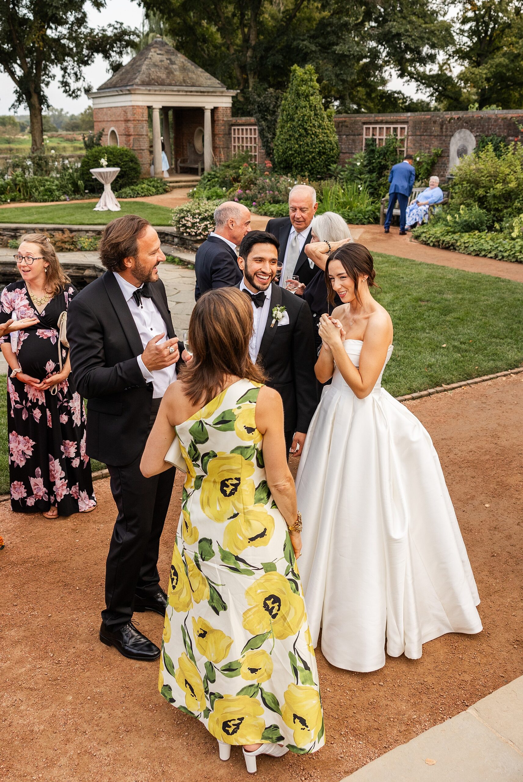 newlyweds mingle with guests during cocktail hour 