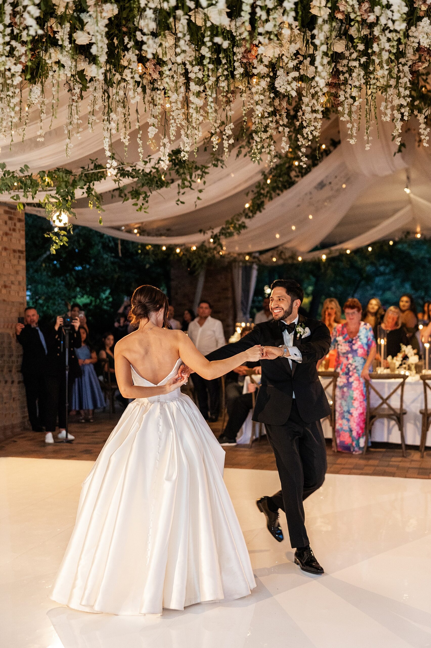 newlyweds share first dance together