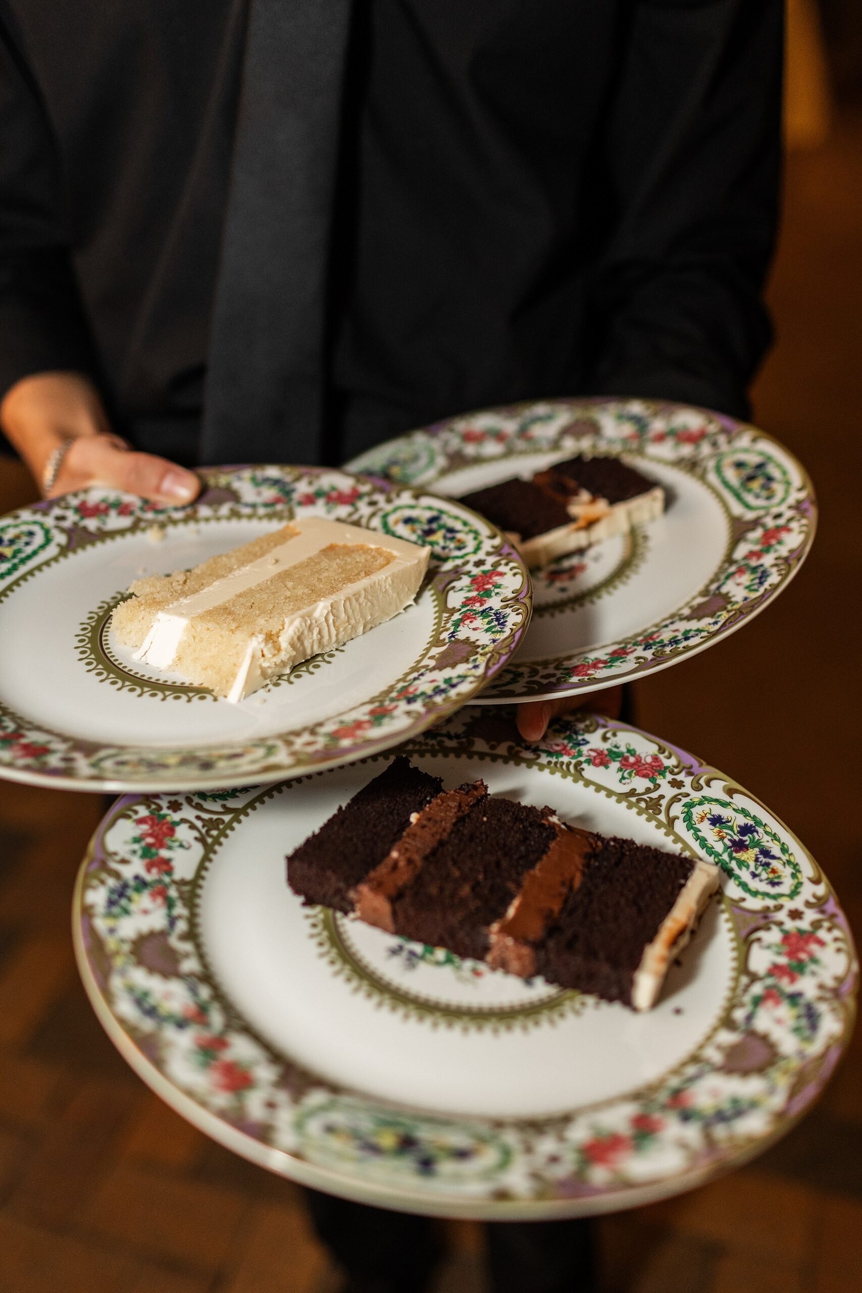 wedding cake served on patterned plates