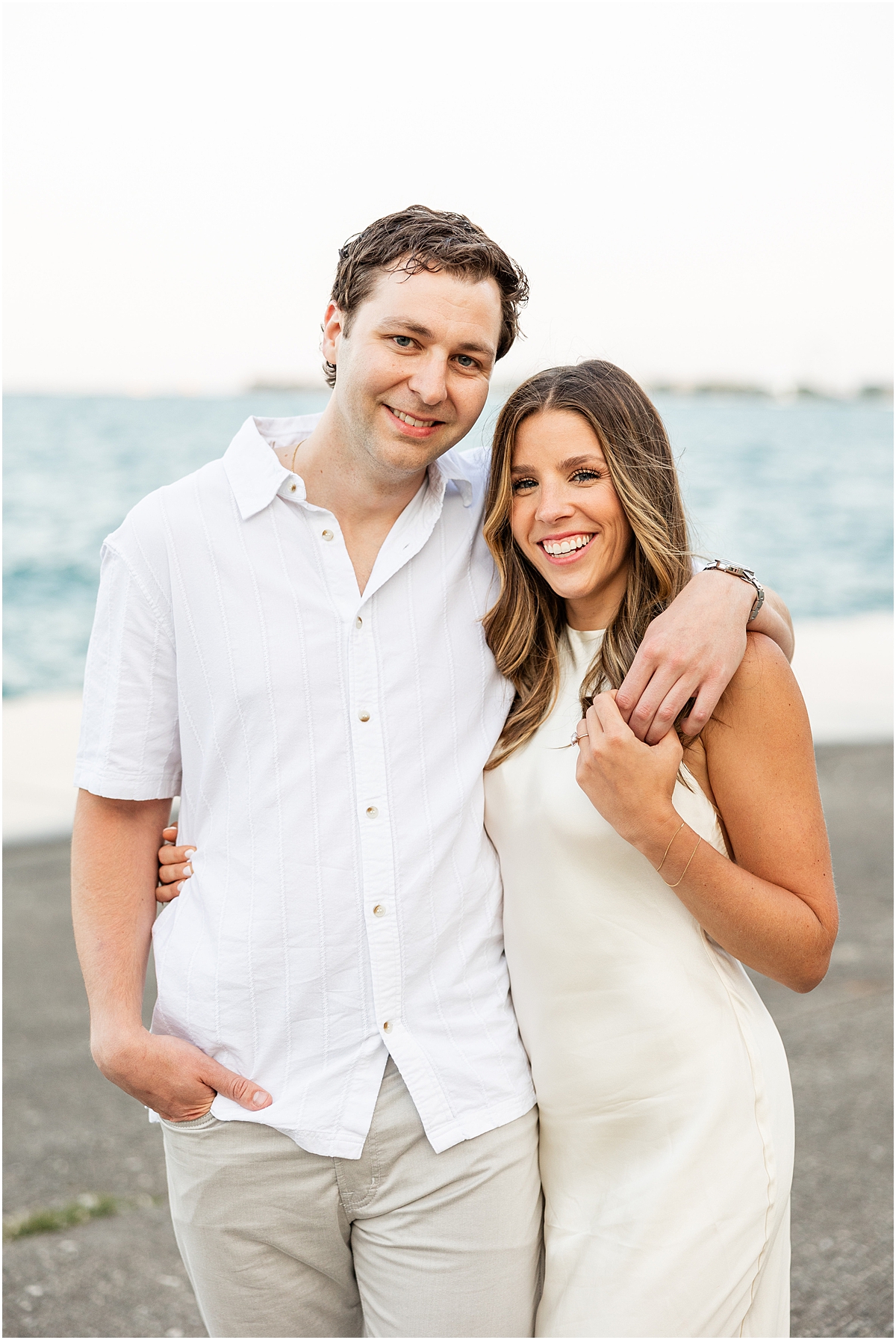 couple in neutral outfits at North avenue Beach