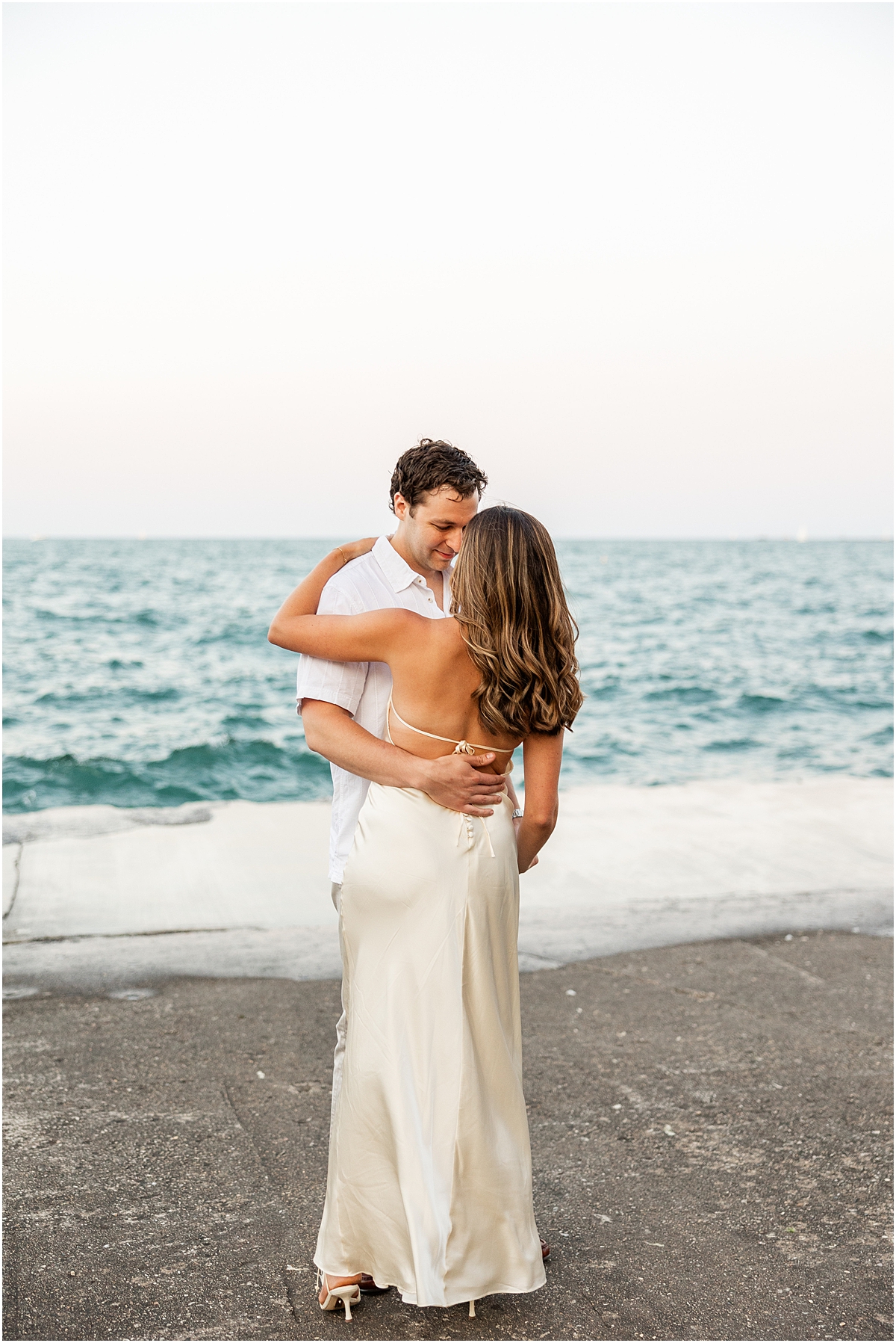 candid engagement photos at North Avenue Beach 