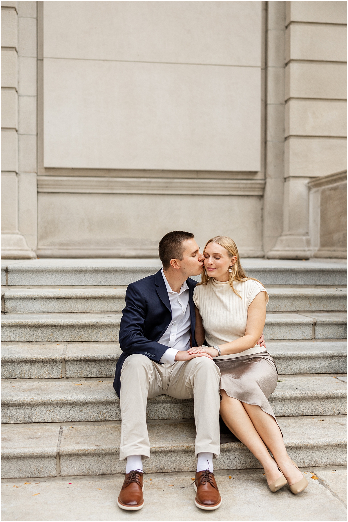 engagement portraits on steps of building 