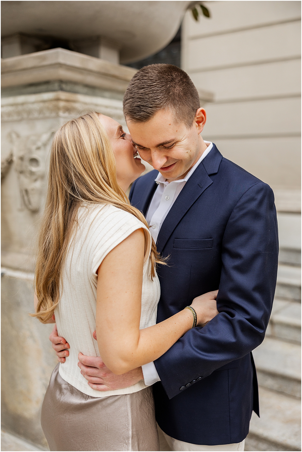 candid engagement photos of couple laughing 