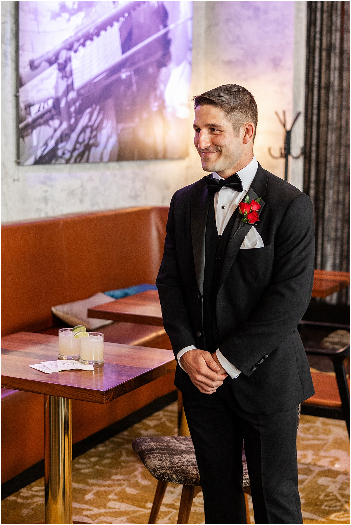 groom waits for bride during first look moment