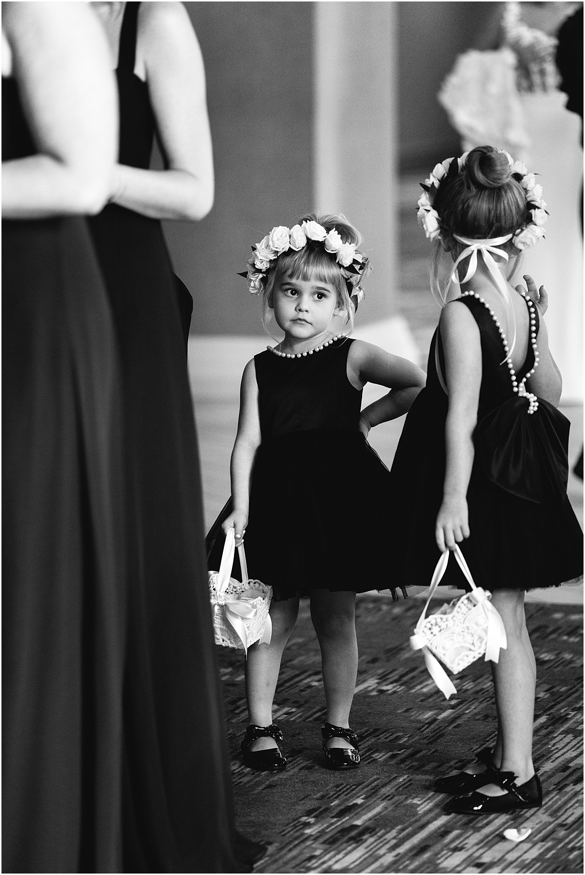 flower girls in classic and glamorous black dresses