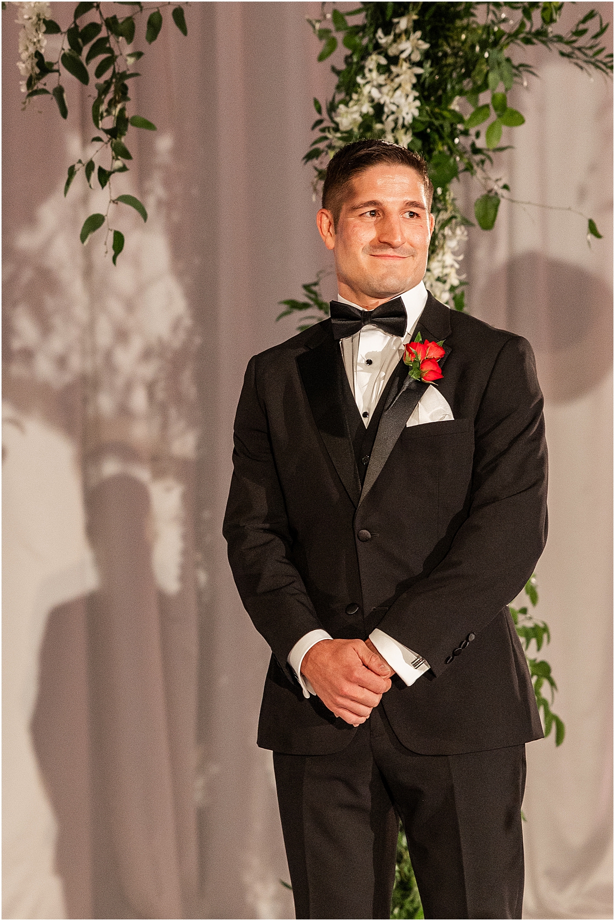 groom waiting for bride to walk down the aisle