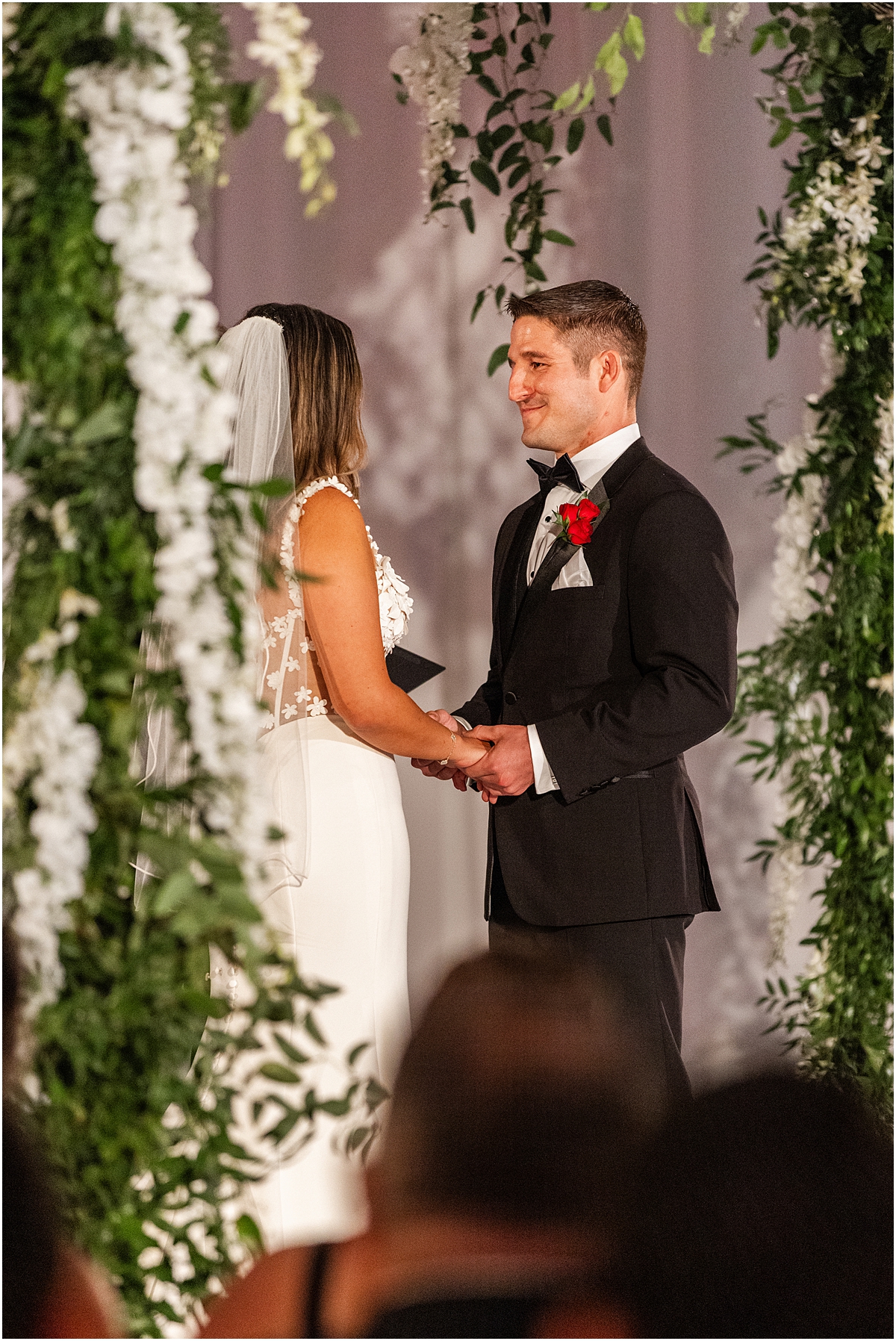 candid moments from wedding ceremony at Chicago Renaissance Hotel 