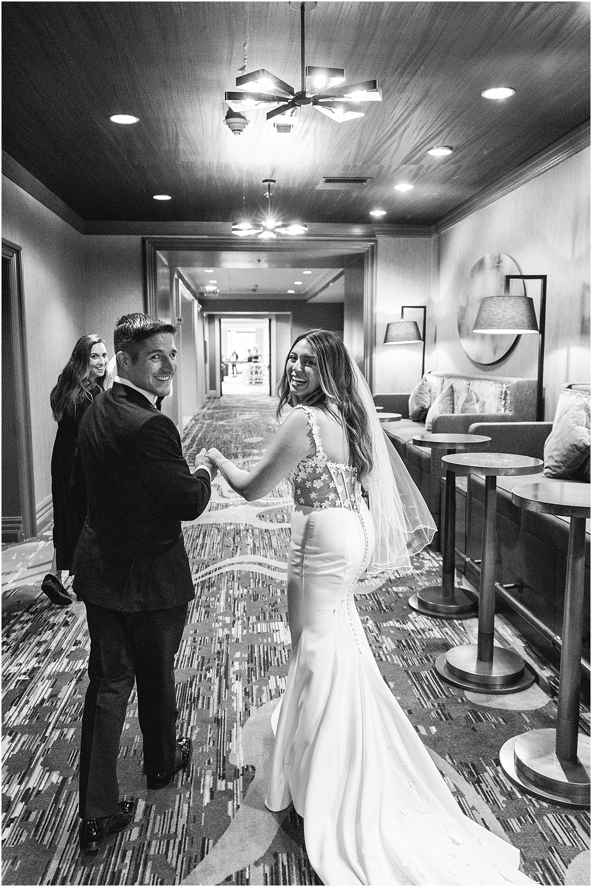 newlyweds walk together after ceremony 