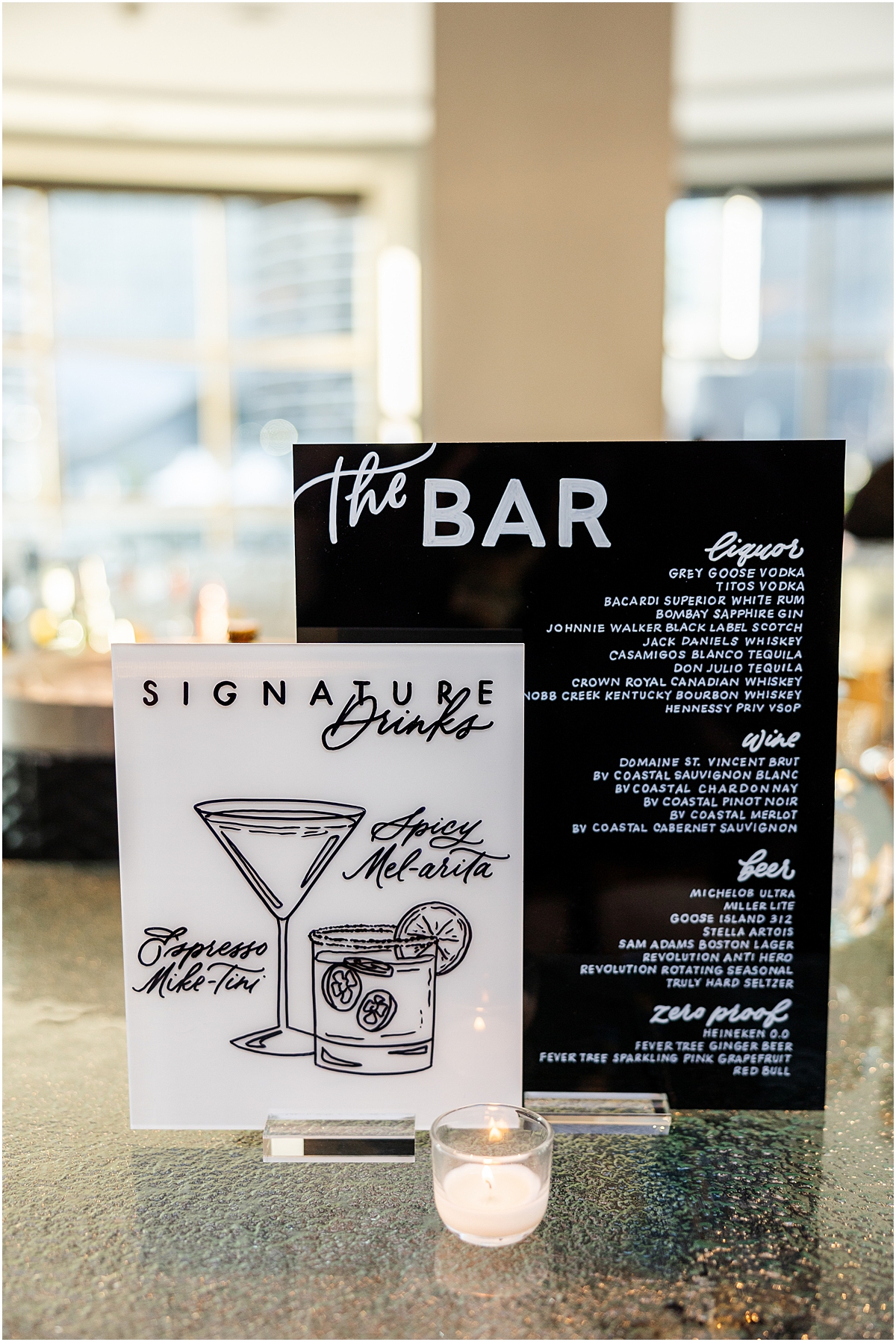 signature drinks and bar sign in classic black and white