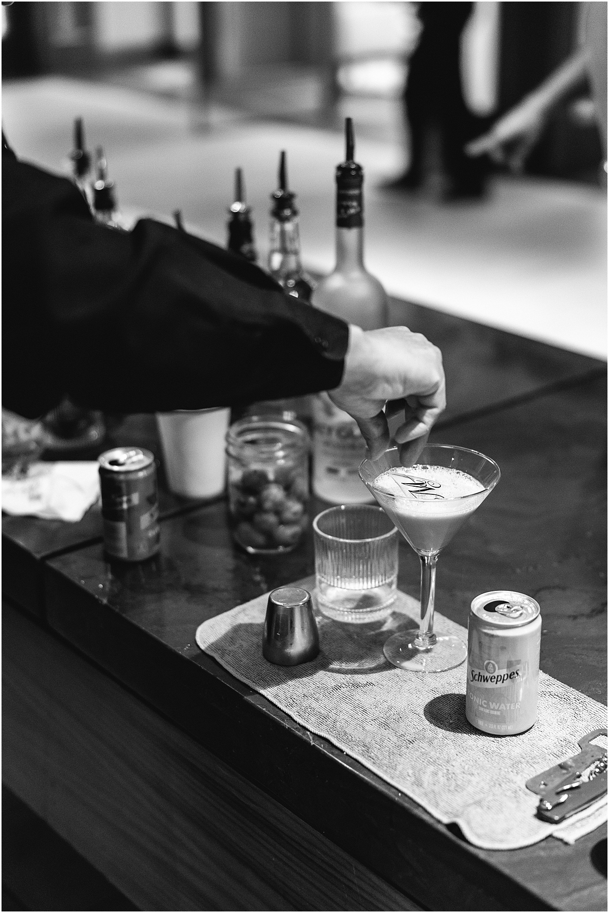 bartender mixes drinks at Glamorous Chicago Renaissance Hotel Wedding