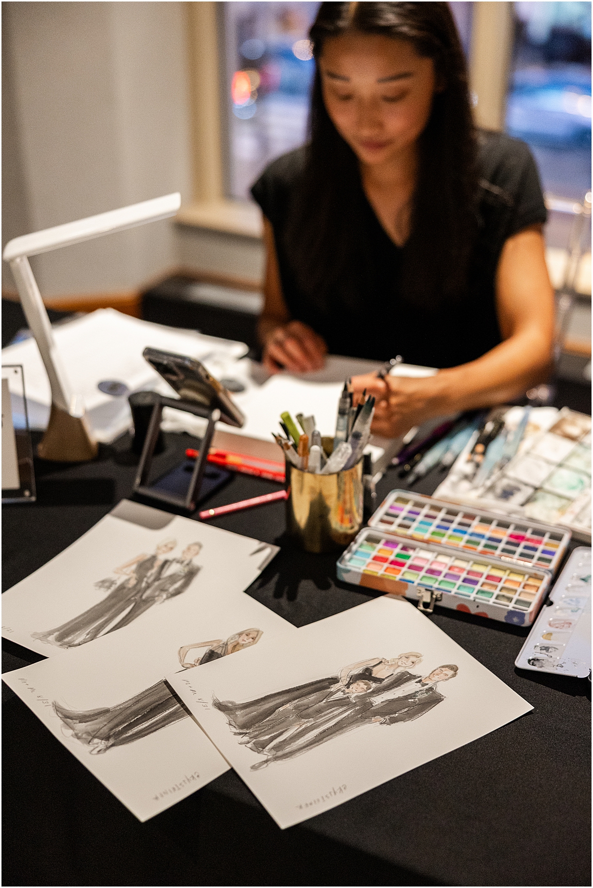 live artists paints guest portraits 