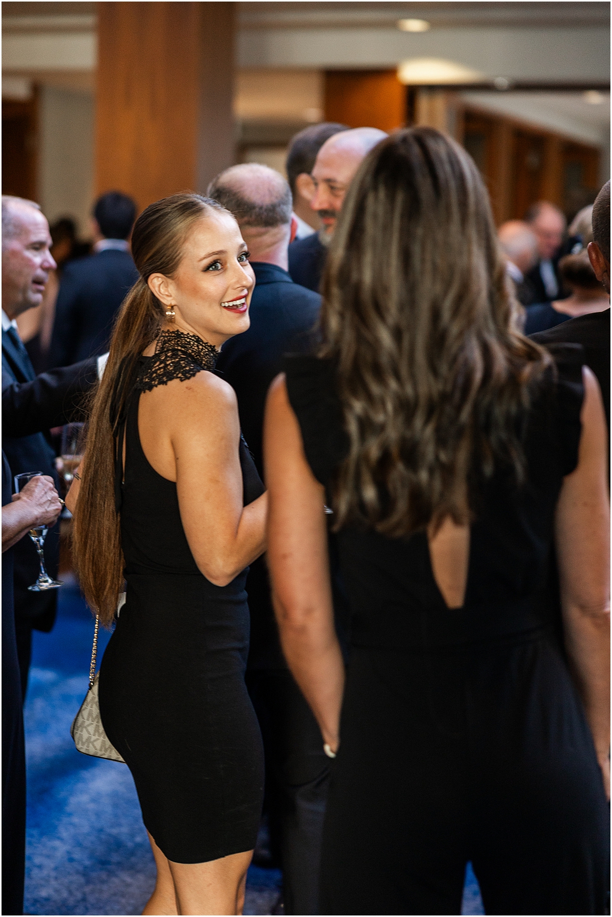 wedding guests mingle during cocktail hour