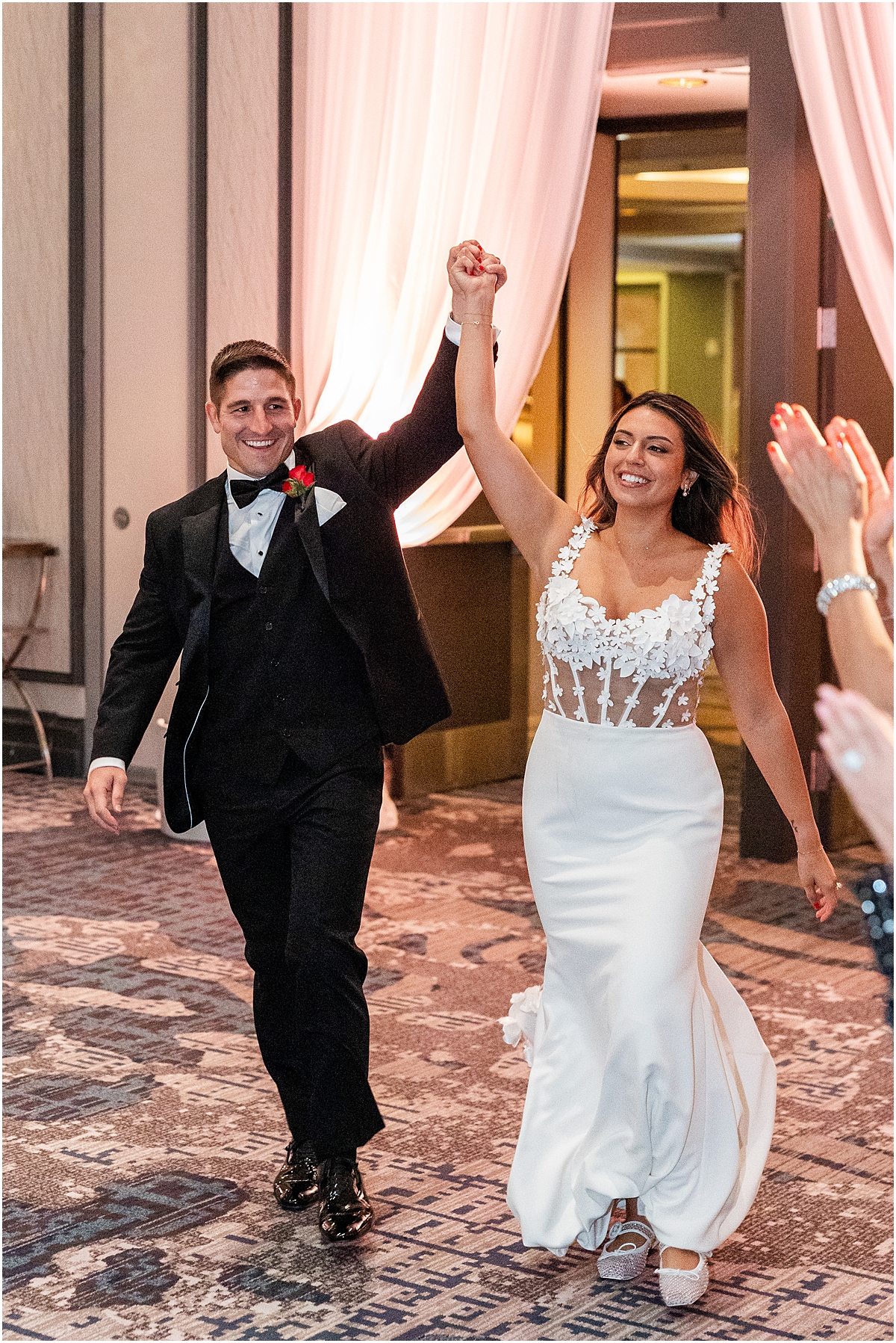 newlyweds enter reception 