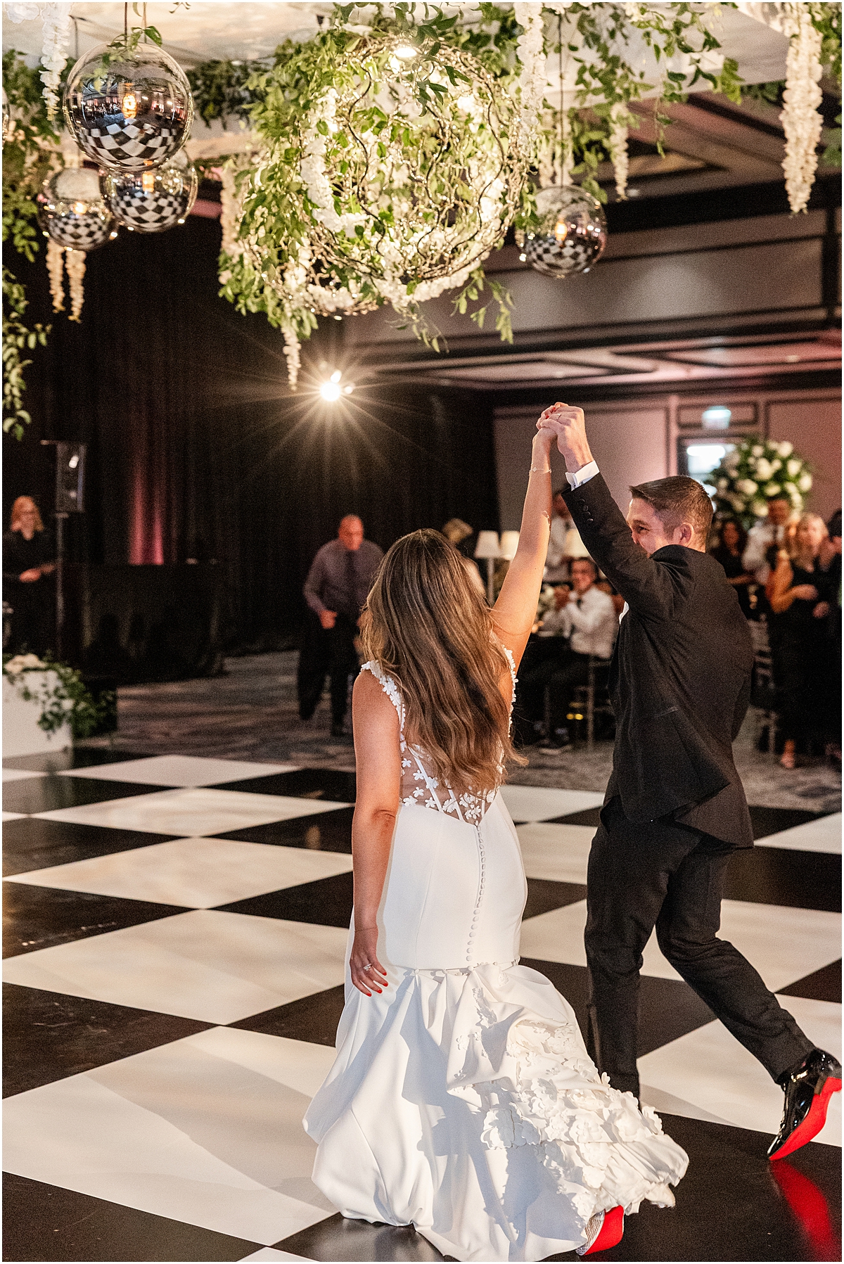 bride and groom enter reception at Chicago Renaissance Hotel reception 